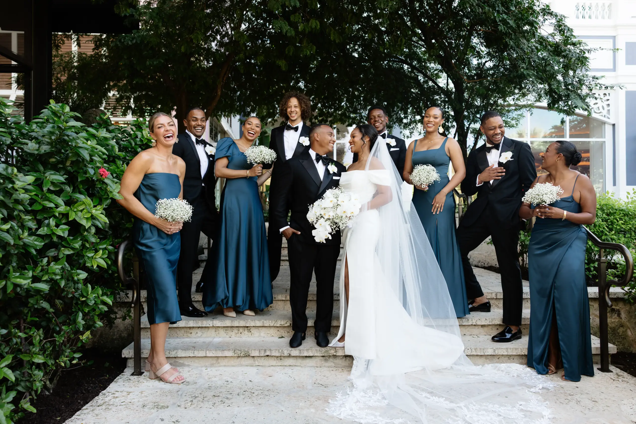 A Bahamas wedding couple share a photo together